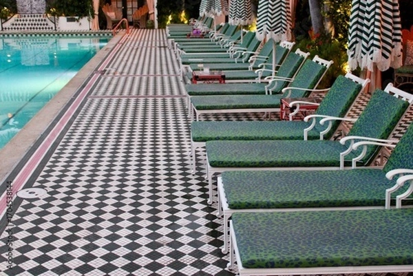 Obraz lounge chairs by the pool