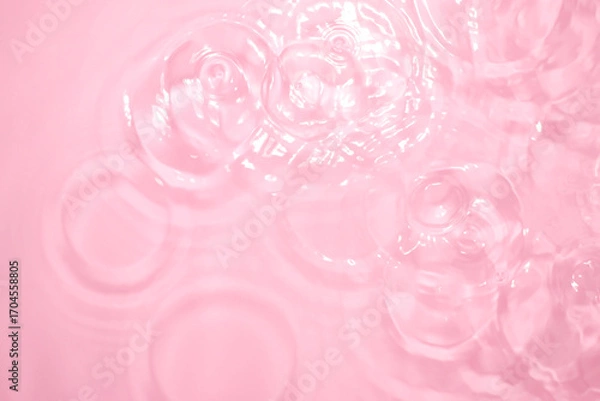 Fototapeta Bubbles and Ripples on Soft Pink Water Surface Background