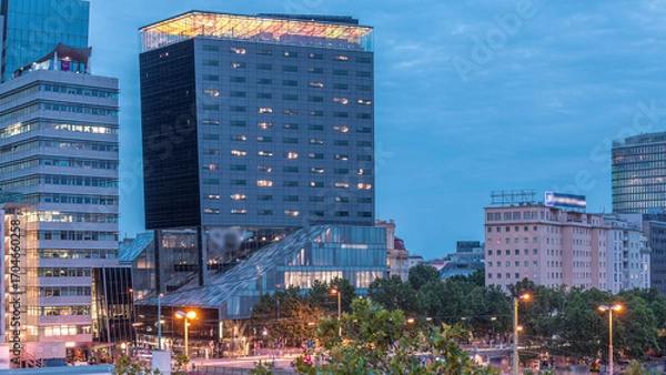 Fototapeta The Schwedenplatz is a square in central Vienna, located at the Danube Canal aerial day to night timelapse