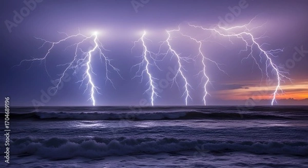 Fototapeta Multiple brilliant lightning strikes illuminating a stormy ocean horizon at dusk with dramatic waves