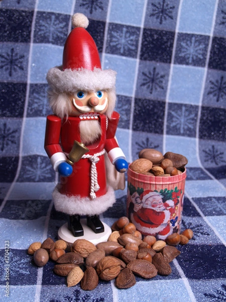 Fototapeta santa nutcracker with mixed nuts