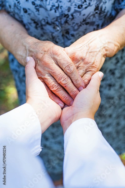 Fototapeta Shaking elderly hands