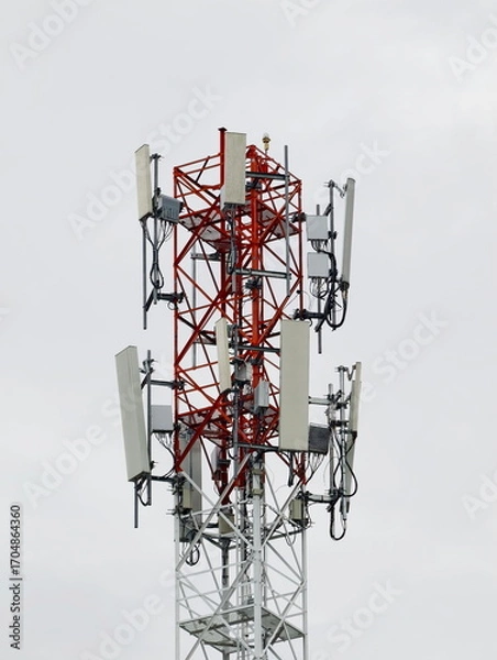 Fototapeta Telecommunication tower of 4G and 5G cellular. Cell Site Base Station. Wireless Communication Antenna Transmitter. Telecommunication tower with antennas.