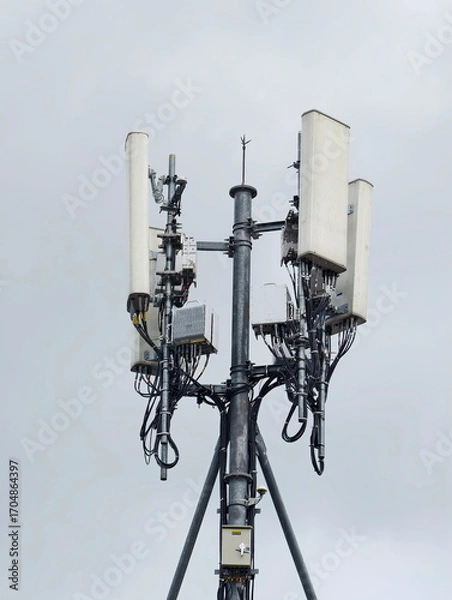 Fototapeta Telecommunication tower of 4G and 5G cellular. Cell Site Base Station. Wireless Communication Antenna Transmitter. Telecommunication tower with antennas.