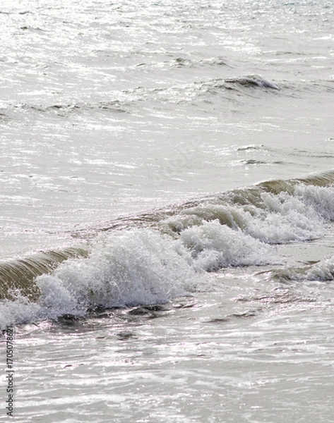 Obraz Close up shot of sea surf with splashing foam