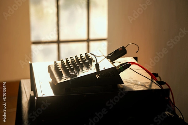 Obraz Illuminated sound mixing console in a studio