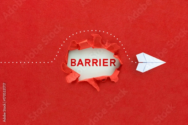 Obraz Concept of overcoming barriers, goal, target. White paper plane on red background