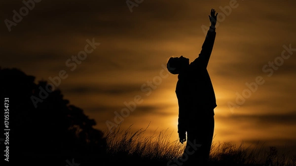 Fototapeta Shadow figure reaching upward, strong backlight casting long shadow, mysterious drama theme