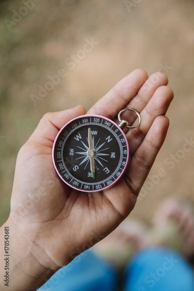 Obraz Asian boy holding compass