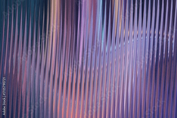 Fototapeta A textured abstract background featuring vertical lines of light in shades of purple, blue, and orange, creating a shimmering, ethereal effect