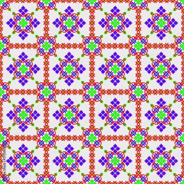 Obraz seamless geometric pattern
Colorful symmetrical geometric pattern featuring flower-like motifs arranged in a grid structure. The design includes vibrant red, green, blue, and purple squares bordered 