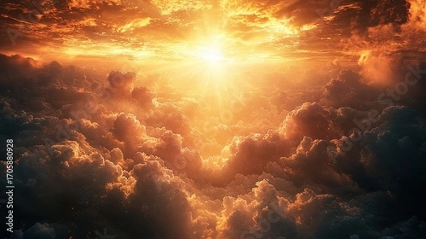 Fototapeta Vivid sunset sky with glowing orange and golden clouds and radiant sunlight piercing through the horizon, creating a dramatic and awe-inspiring celestial scene