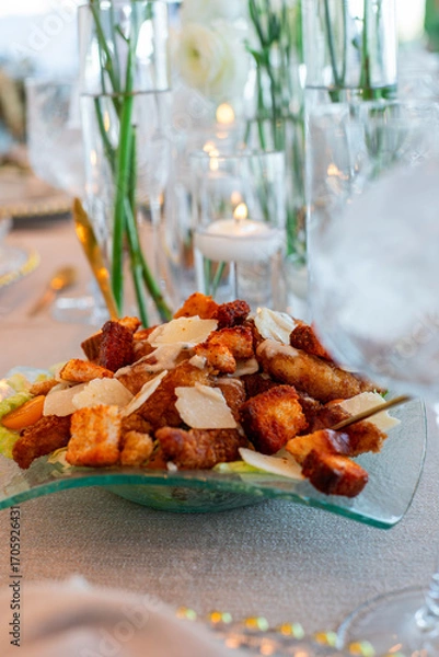 Fototapeta Caesar salad with croutons and parmesan cheese