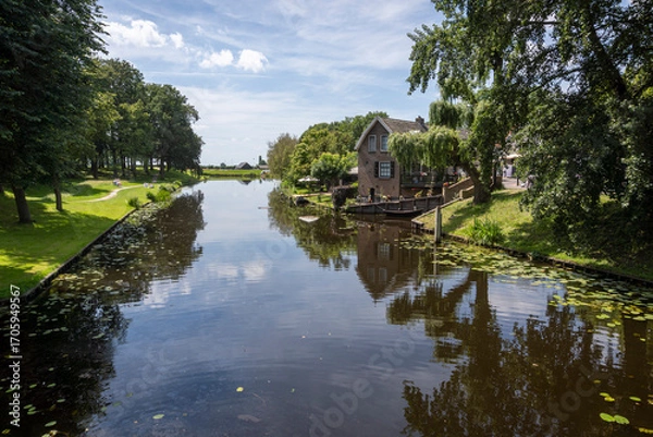 Fototapeta View of the moat surrounding the medieval town of Elburg, Netherlands