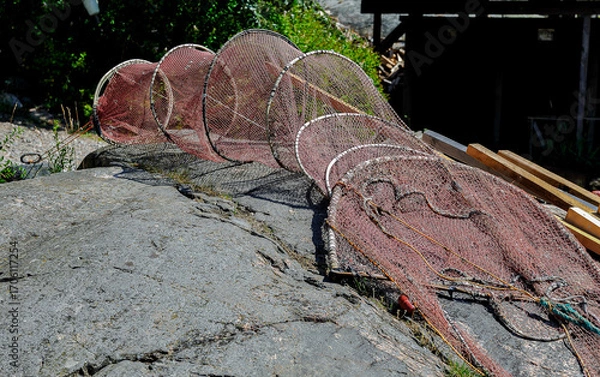 Fototapeta Fyke net on a granite rock in the Baltic Sea archipelago of Gryt, Sweden