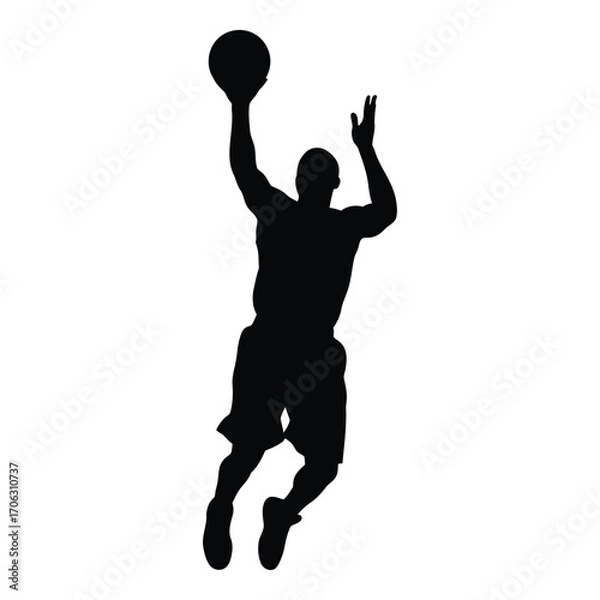 Fototapeta Dynamic silhouette of a basketball player shooting a ball in mid-air silhouette
