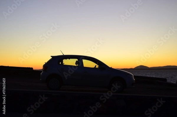 Obraz the car in the sunset 