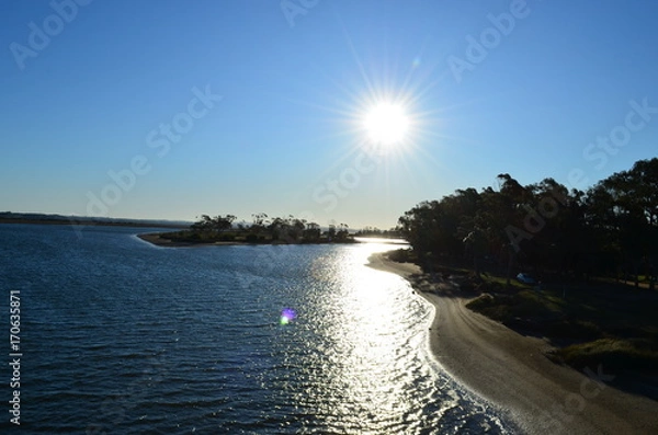 Obraz The Sun in the river 