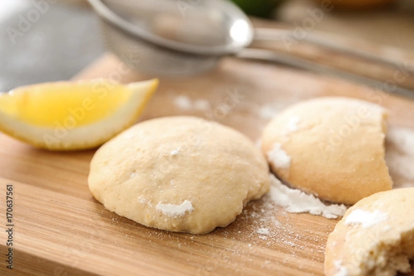 Fototapeta Homemade cookies with lemon flavor on wooden board