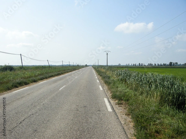 Obraz Menschenleere Straße in der Landschaft