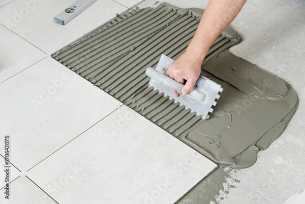 Obraz Laying Ceramic Tiles.