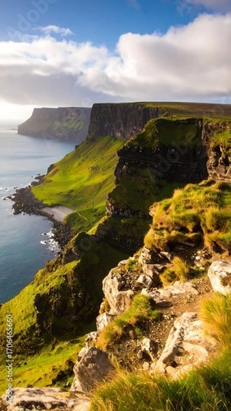 Obraz Dramatic coastal cliffs meet a vibrant green valley
