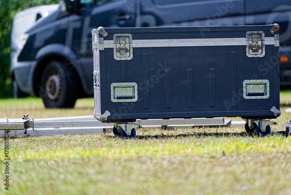 Fototapeta Rolling plastic flight case with metal frame and latches