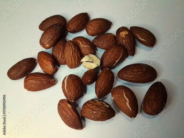 Fototapeta close up of roasted almonds 