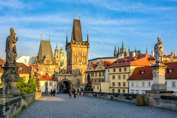 Fototapeta Prague's main sights at dawn: Lesser Town Bridge Towers on Charles Bridge and Prague castel. Czech Republic, Bohemia