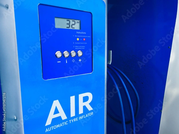 Fototapeta Powering Tomorrow, One Charge at a Time at the EV Station