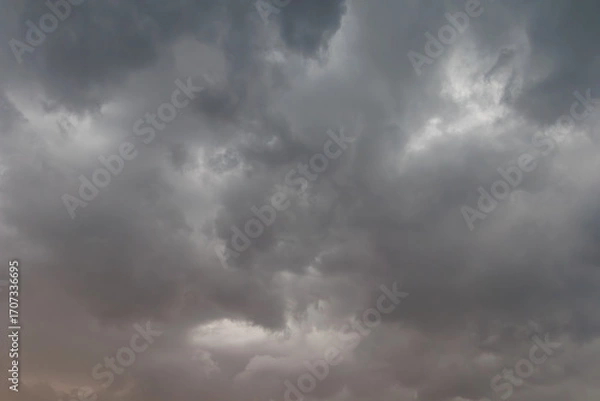 Obraz Dark storm clouds over evening sky