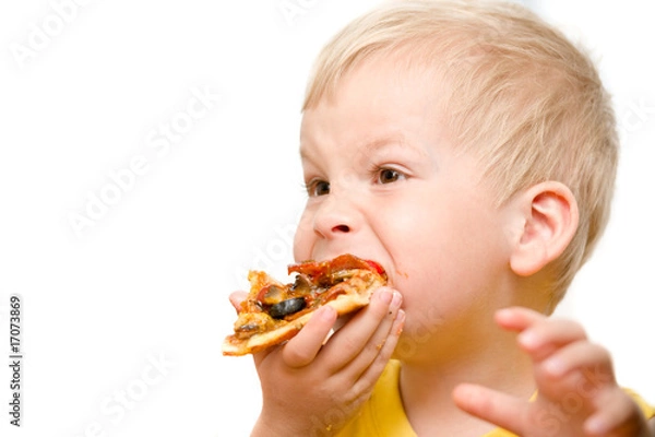 Fototapeta Child eating pizza