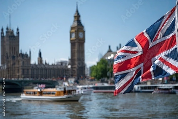 Obraz Union Jack Flag Waving Above Thames River in London with Big Ben and Houses of Parliament in Background During Sunny Day