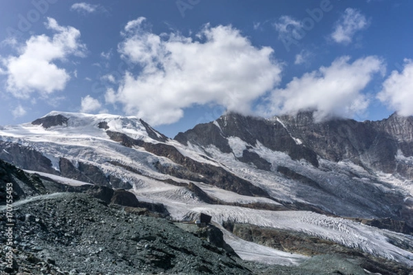 Fototapeta Big mountain (Alphubel, over 4000m) and a part of the Mischabel group in the alps of switzerland