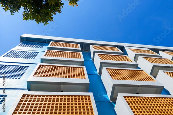 Fototapeta View of a multi storey building seen from below