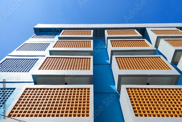 Fototapeta View of a multi storey building seen from below
