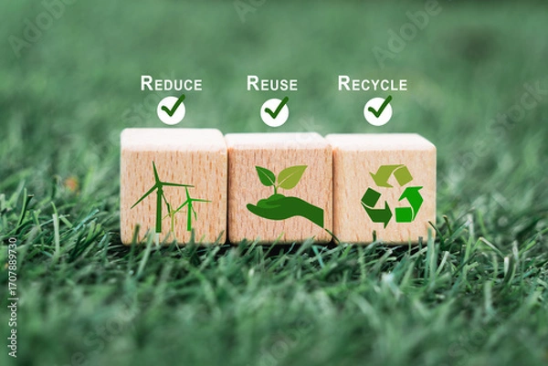 Fototapeta wooden cube block with reduce, reuse and recycle symbol and text on green grass for save world, environmental concept