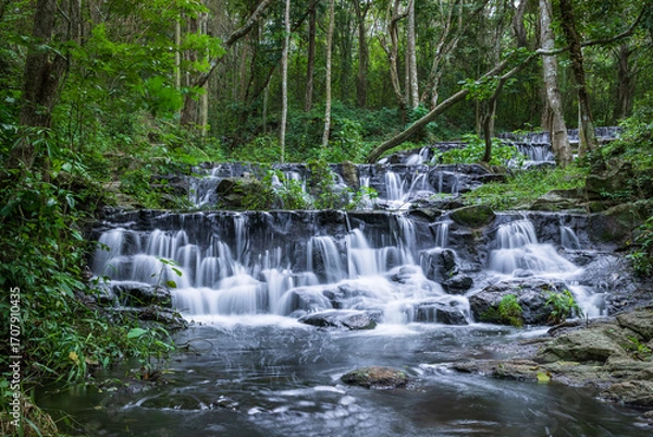 Fototapeta Samlan Waterfall, tier 3, tropical waterfall cascading through lush jungle in Thailand's natural forest reserve.