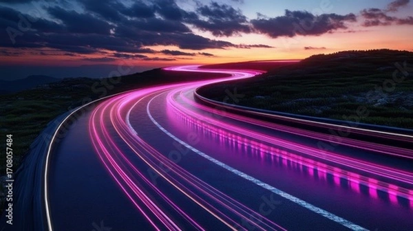 Fototapeta Illuminated Highway at Dusk with Light Streaks and Mountain Scenery Backdrop