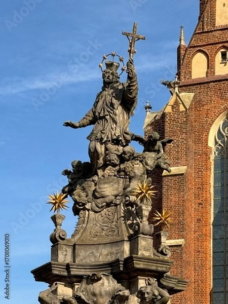 Fototapeta Cathedral in Wroclaw, Poland with statue in front of it 