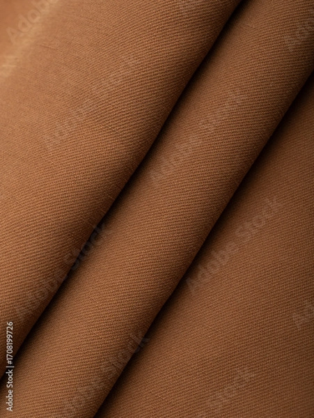 Obraz Dark dense fabric for sewing clothes, ironed, the texture of the fabric is visible