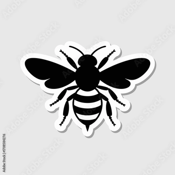 Fototapeta Black silhouette of a bee with striped abdomen on a white background