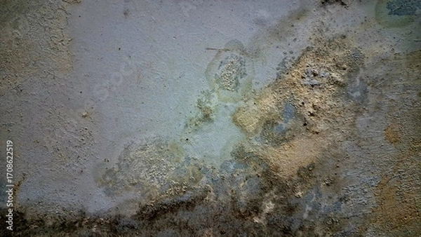 Fototapeta Close-up old grunge textured concrete wall background with peeling paint, damaged surface, cracks, and moisture stains