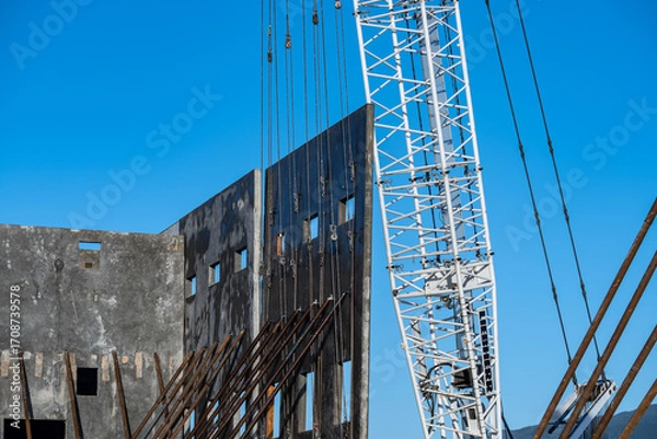 Fototapeta Tilt-Up Process on a Construction Site