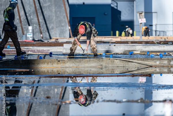 Fototapeta Tilt-Up Process on a Construction Site