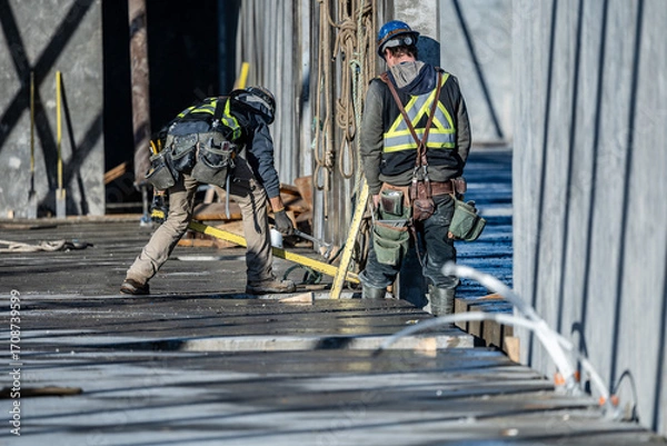 Fototapeta Tilt-Up Process on a Construction Site