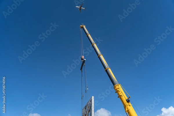 Fototapeta Tilt-Up Process on a Construction Site