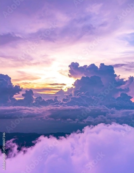 Fototapeta A vibrant sunset through clouds