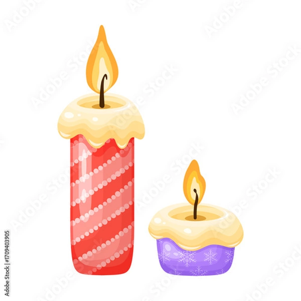 Fototapeta Two festive candles with glowing flames. perfect for holiday and winter designs.