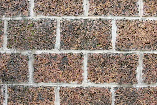 Fototapeta Old brick wall in decoration architecture for the design background.